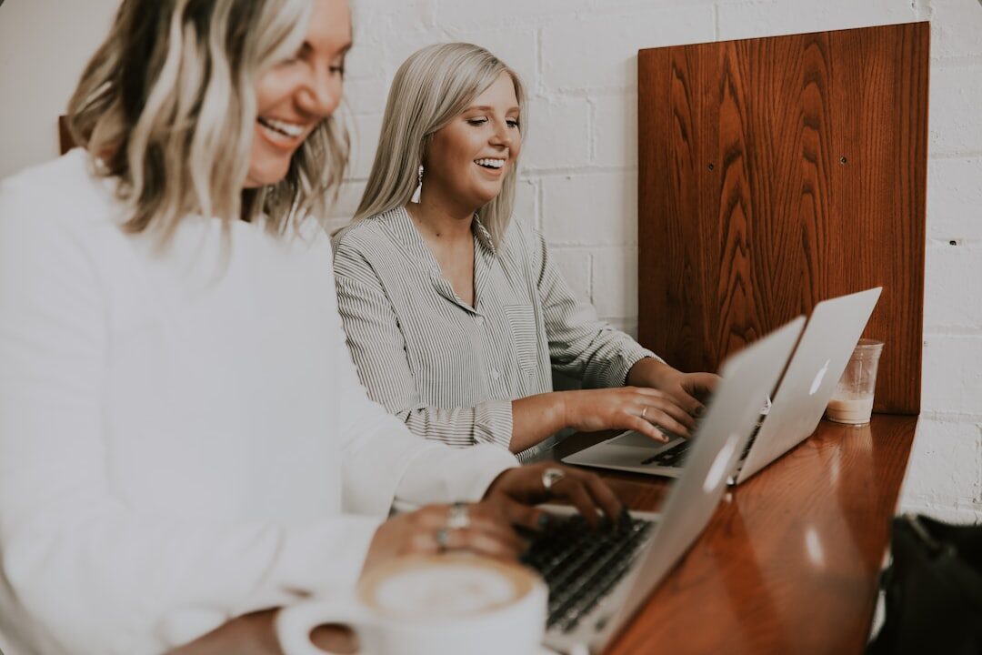 team using laptop in office